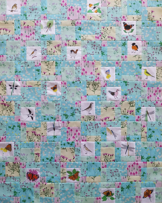 Disappearing nine patch quilt